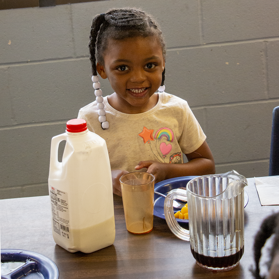 A child eats lunch at the Child Development Center