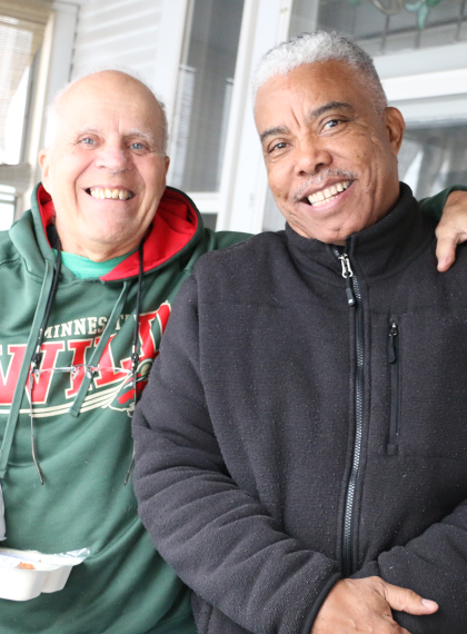 Meals on Wheels recipient Ron Walcheski with volunteer Steven Jones