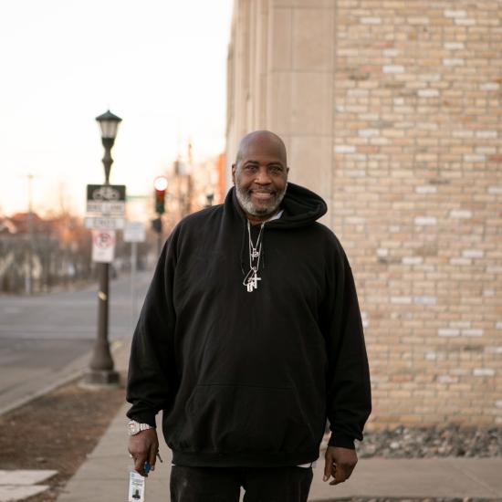 Mr. Allen walking down the street in Saint Paul, MN